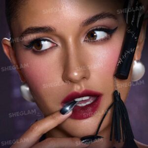 تینت لب پیل آف شیگلم مدل زن گربه ای CATWOMAN رنگ High sta... 9 CATWOMAN SHEGLAM I Am Not A Kitten Peel Off Lip Tint High Stakes 3 تینت لب پیل آف شیگلم مدل زن گربه ای CATWOMAN رنگ High sta...